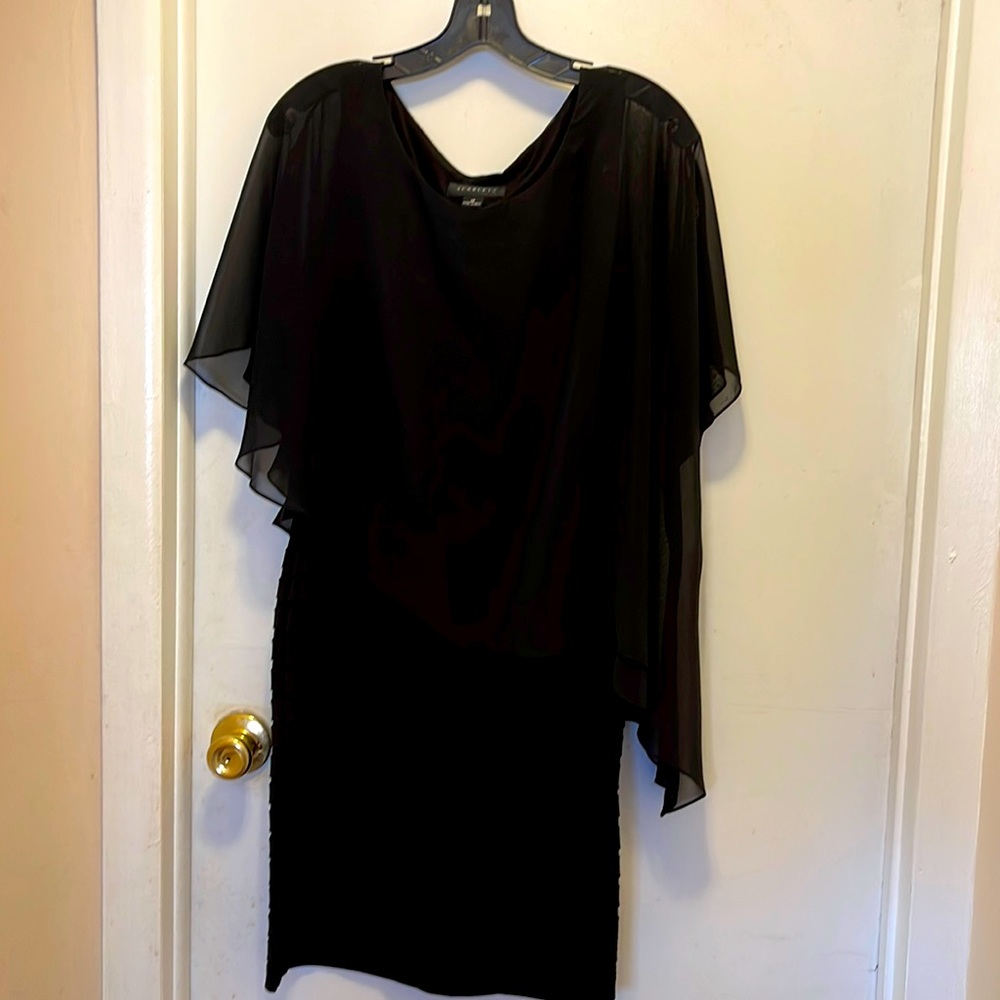 Elegant black dress by Scarlett.